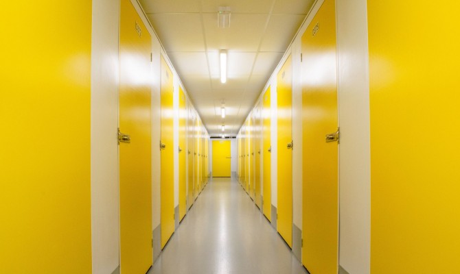 Wide, bright storage unit corridor