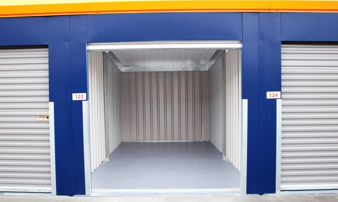 Roller shutter door storage unit